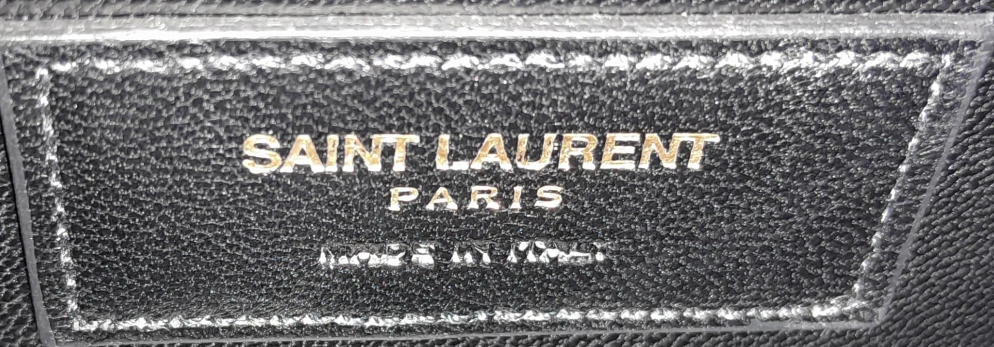 A Saint Laurent envelope shoulder bag, soft beige calfskin with gold hardware and strap, press - Image 9 of 11