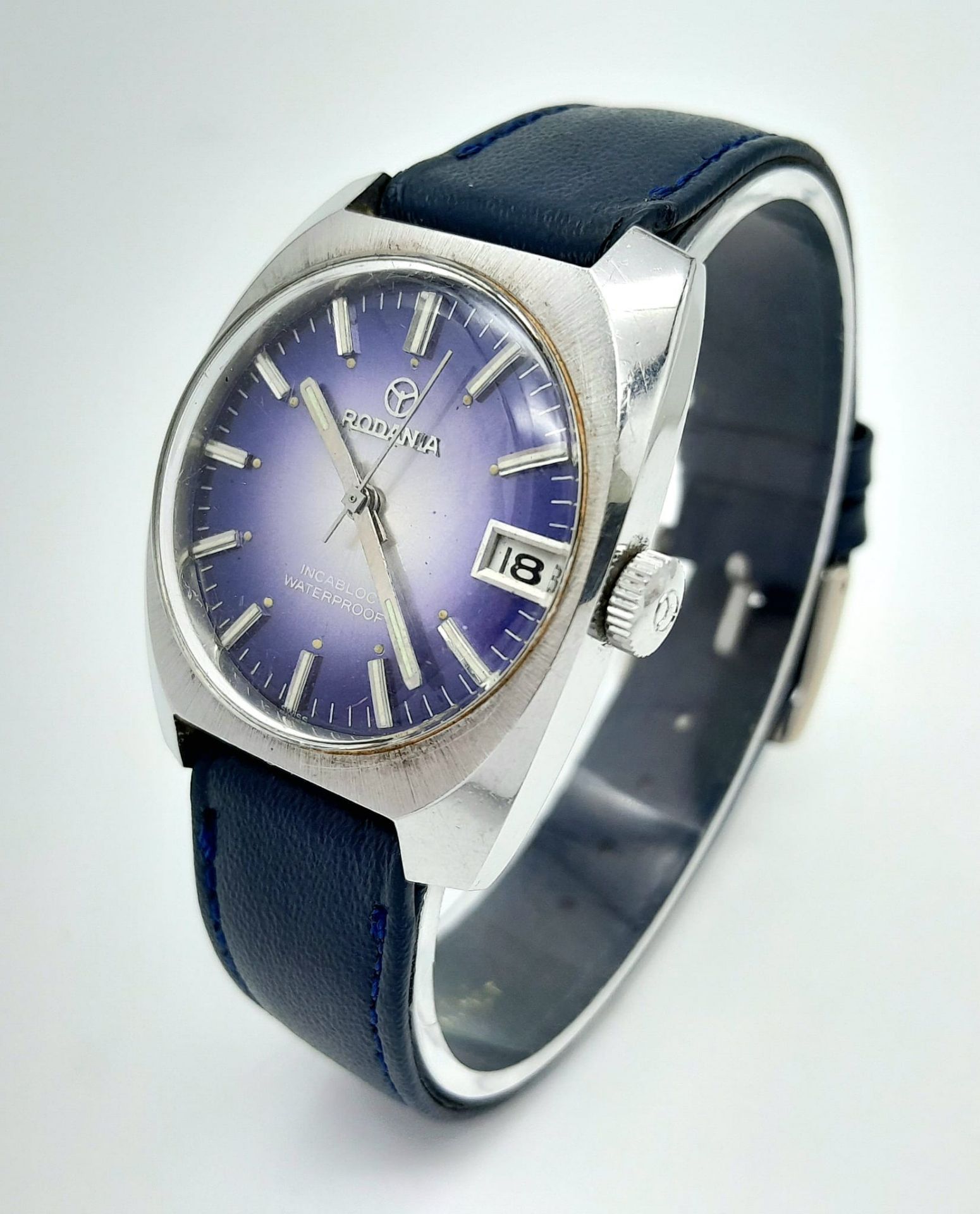 A Vintage Rodania Mechanical Gents Watch. Blue leather strap. Stainless steel case - 32mm. Purple - Image 3 of 8