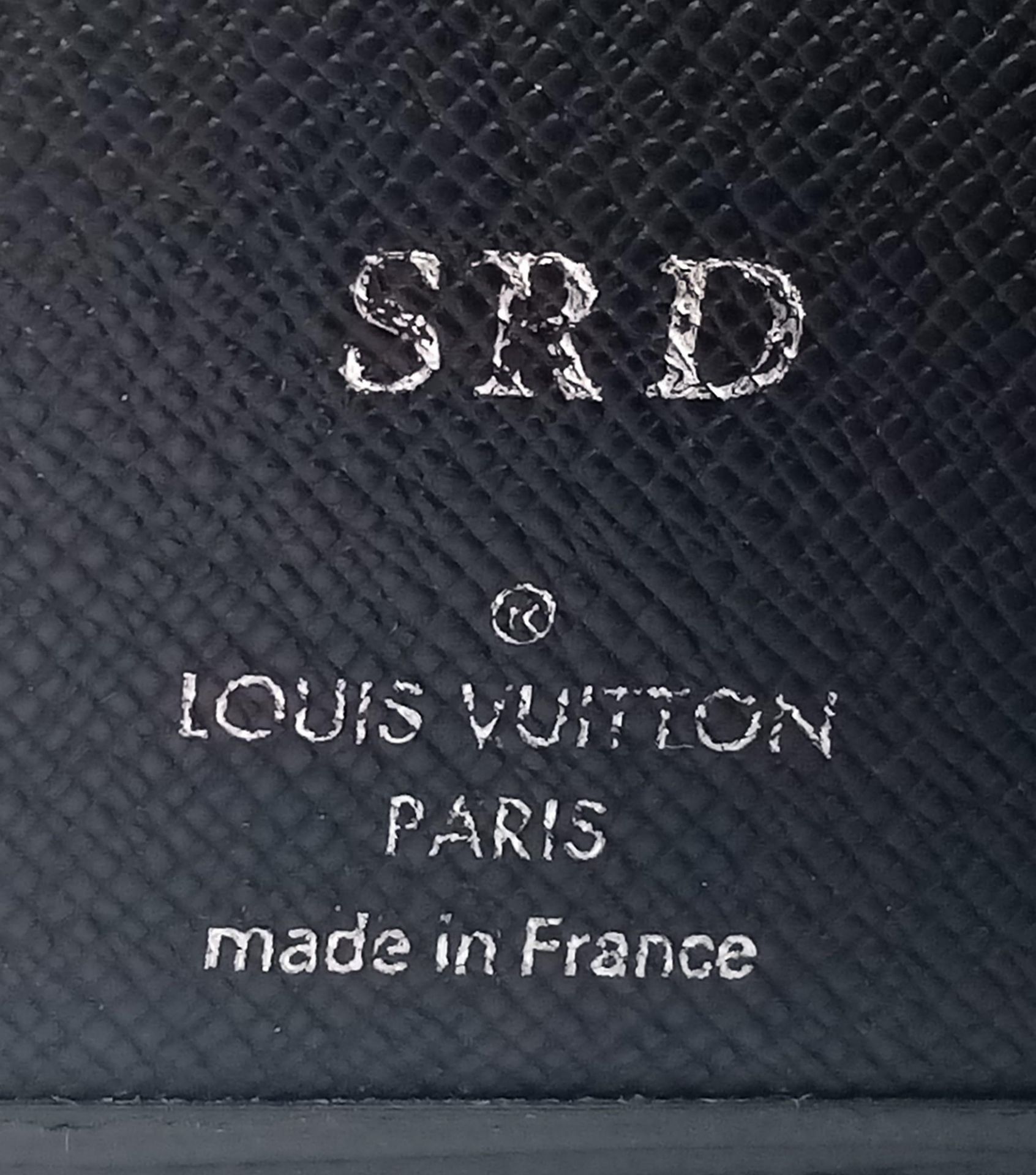 A Louis Vuitton black cowhide leather wallet. Engraved with initials SRD. Size approx. 11x11cm. - Image 5 of 5