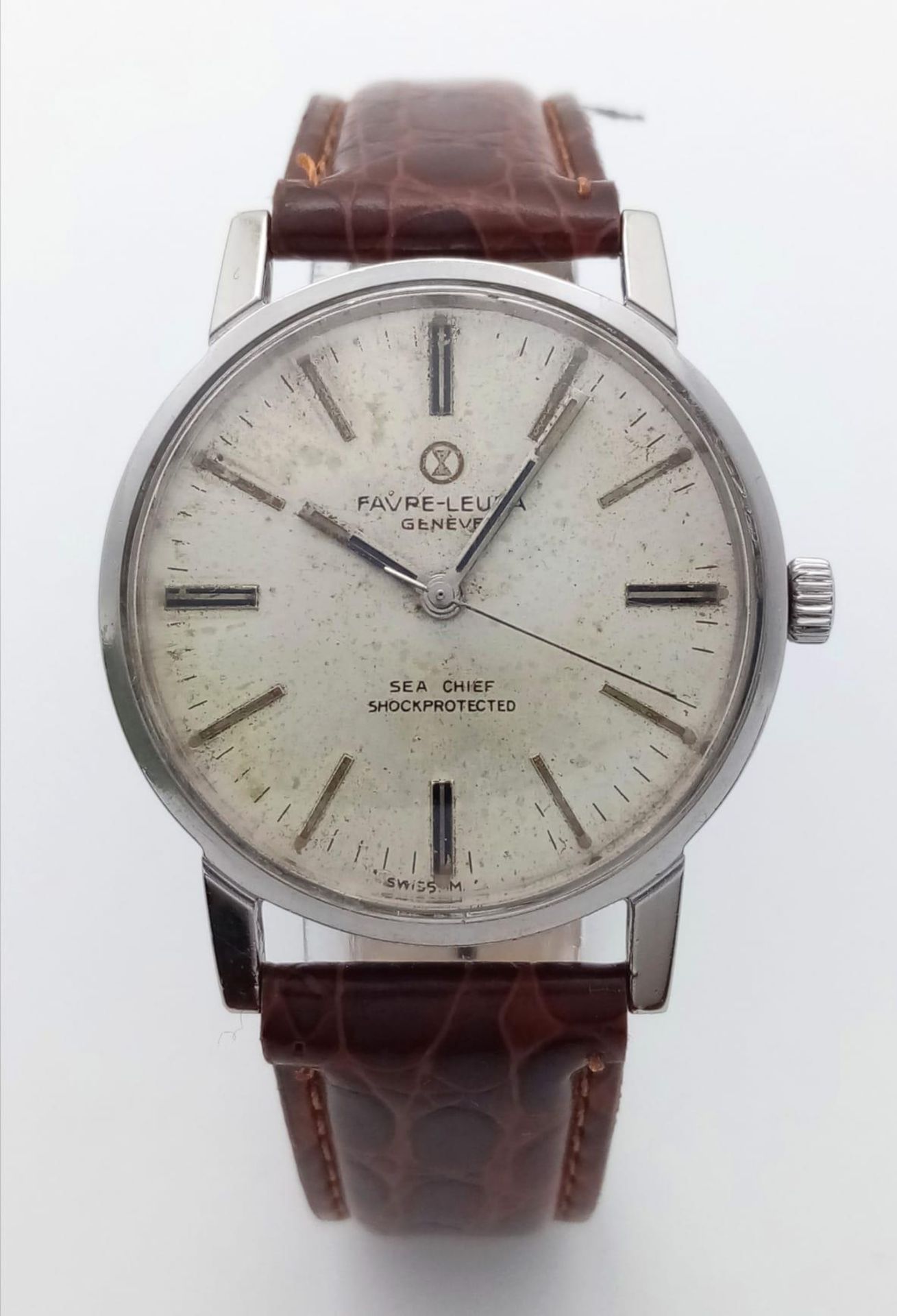 A Vintage Favre-Leuba Sea-Chief Gents Watch. Brown leather strap. Stainless steel case - 35mm. White