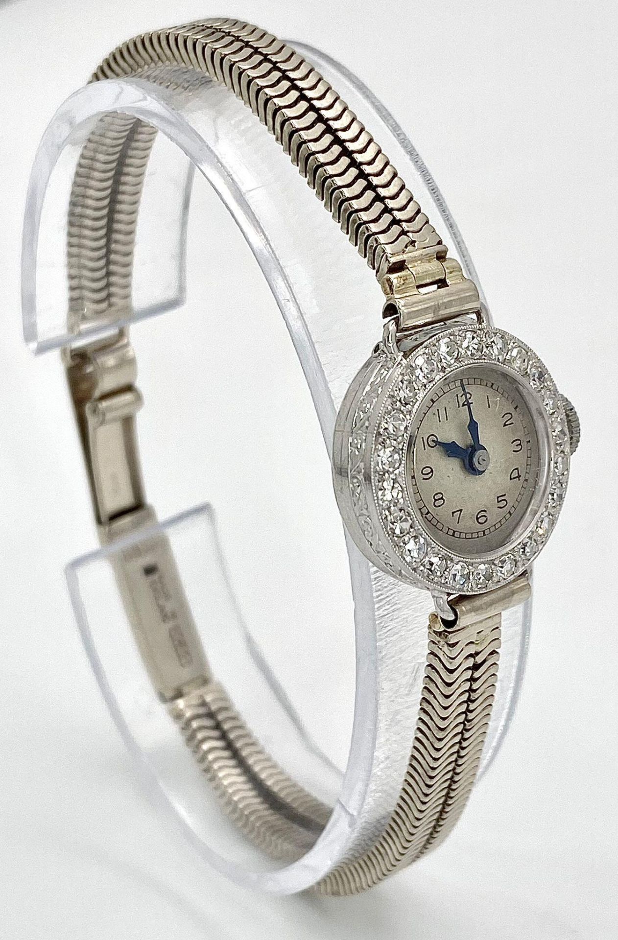 A ladies, platinum watch with diamond bezel and a 9 K white gold double snake chain bracelet. The - Image 3 of 6