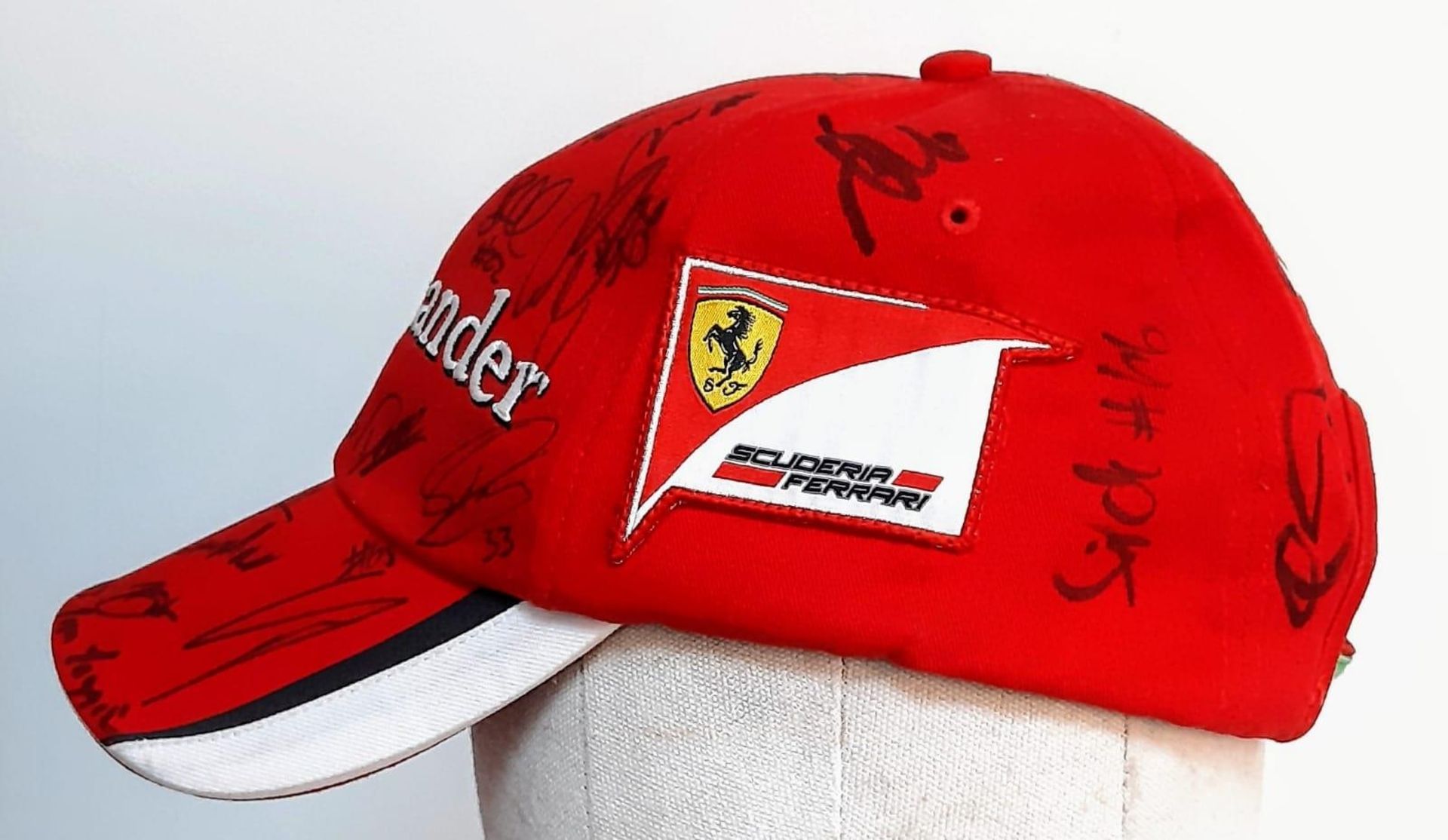 An Official Ferrari Team Cap - Over 20 signatures including Ferrari drivers and team principals. - Image 2 of 14