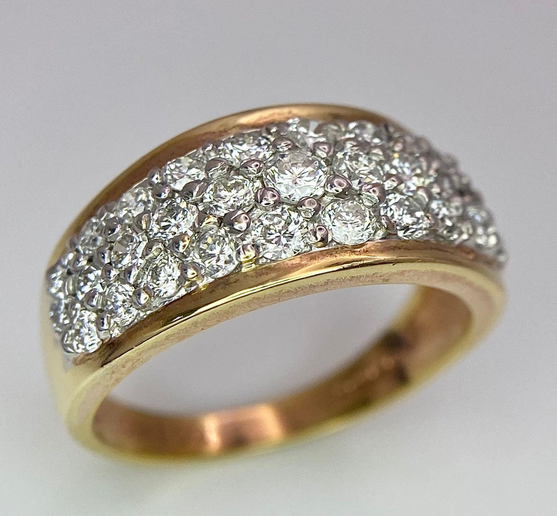 An 18K Yellow Gold Three-Row Cluster Ring. 1ctw. Size M. 5.5g total weight.
