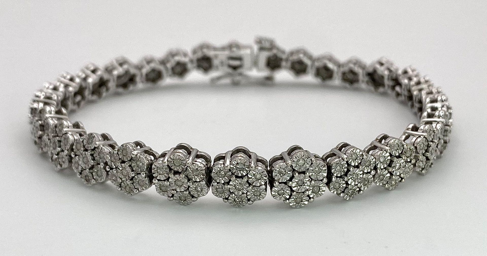 A 9K White Gold Graduated Link Diamond Tennis Bracelet. 29 links of seven small diamonds - 203 - Image 4 of 9
