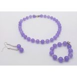 A traditional, Chinese, top notch, Lavender Jade, necklace, bracelet and earrings set, in a