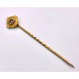 An Antique Mid-Karat Gold and Diamond Stick-Pin. 6.5cm. Comes with its original French case. 1.52g