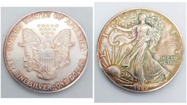 A Mint Condition Uncirculated 1989 United States Silver Eagle with Certificate of Authenticity. Very