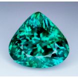 A Beautiful 17ct Green/Blue Topaz Gemstone. Trillion shape with no visible marks or inclusions. No