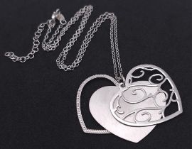 A Sterling Silver Heart Pendant on a Delicate Silver Necklace. 3cm - pendant. 42cm necklace length.