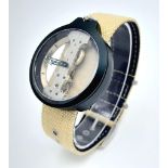 A Verticale Mechanical Top Winder Unisex Watch. Cream textile strap. Black tone ceramic gilded