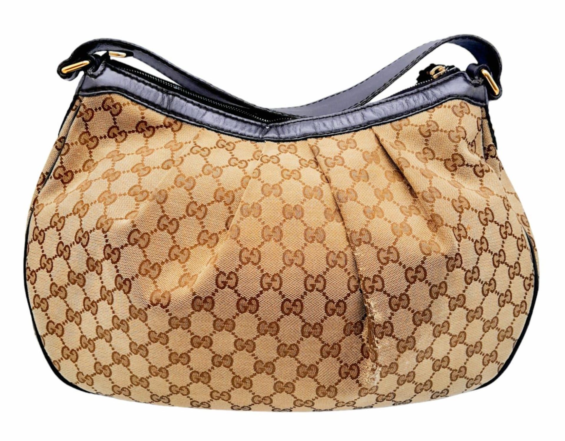 A Gucci Brown Monogram Suki Shoulder Bag. Pleated canvas exterior with leather trim and strap, - Image 3 of 9