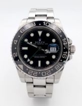 A Rolex GMT - Master II Automatic Gents Watch. Model 116710LN. Stainless steel bracelet and case -
