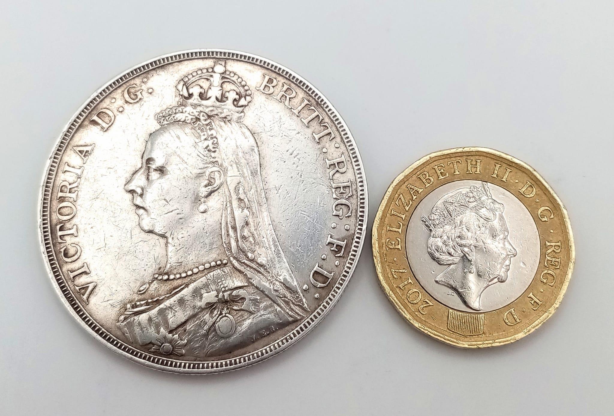 An 1889 Queen Victoria Silver Crown Coin. VF grade but please see photos. - Image 2 of 2