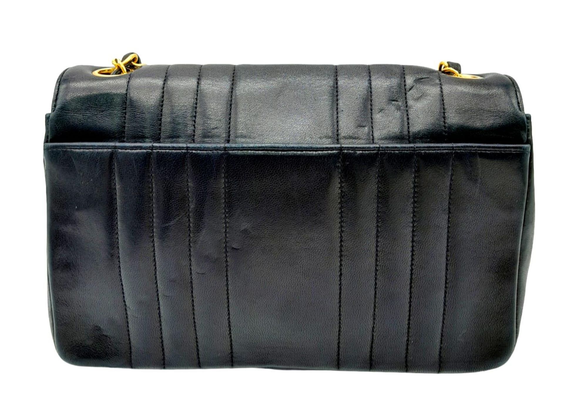 An Early 1990s Chanel Mademoiselle Classic Flap Chain Bag. Black lambskin leather. Gold plated - Image 5 of 17