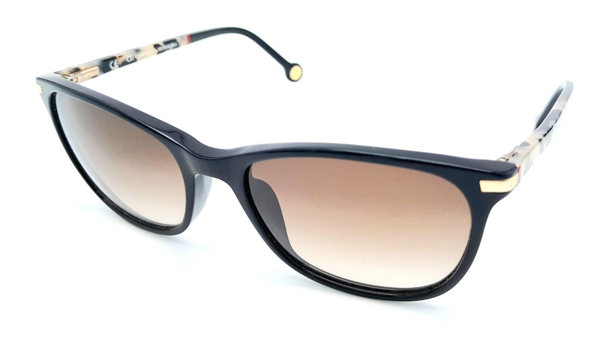A Pair of Designer Carolina Herrera Sunglasses. Good condition.