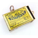 A VINTAGE 9K YELLOW GOLD ENAMELLED BRITISH MADE MATCHBOX CHARM/PENDANT, WHICH PULLS OUT LIKE A
