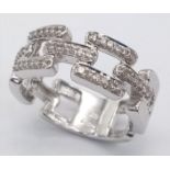 AN UNIQUE DESIGNED 9K WHITE GOLD DIAMOND SET FANCY RING, WEIGHT 4.7G SIZE N