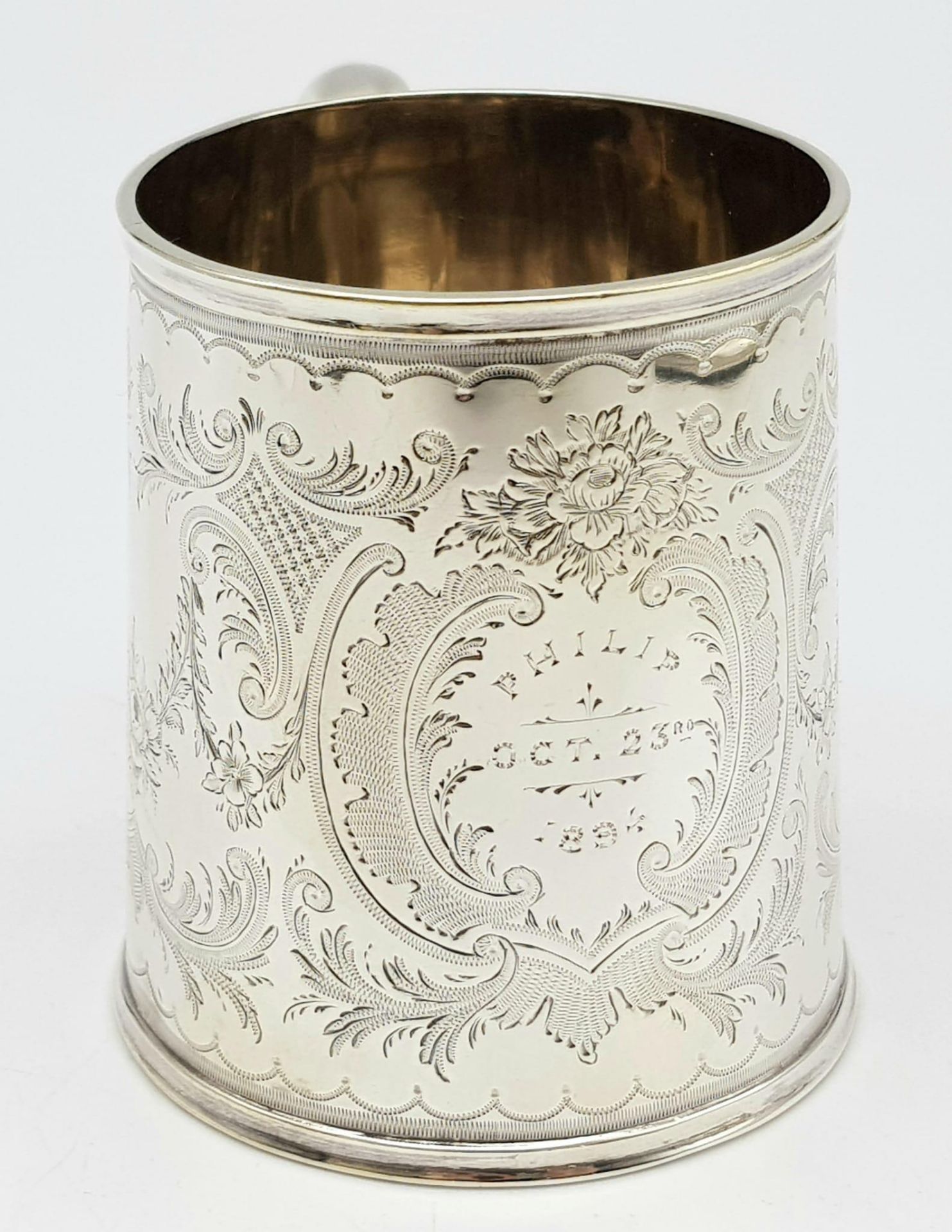 AN ANTIQUE SILVER TANKARD INSCRIBED "PHILIP OCTOBER 23rd 1894" ALL HAND ENGRAVED BY A MASTER - Image 2 of 8