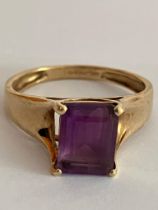 9 carat GOLD RING Having a large Emerald Cut (1.5 carat) AMETHYST SOLITAIRE set to top. Full