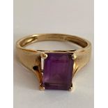 9 carat GOLD RING Having a large Emerald Cut (1.5 carat) AMETHYST SOLITAIRE set to top. Full