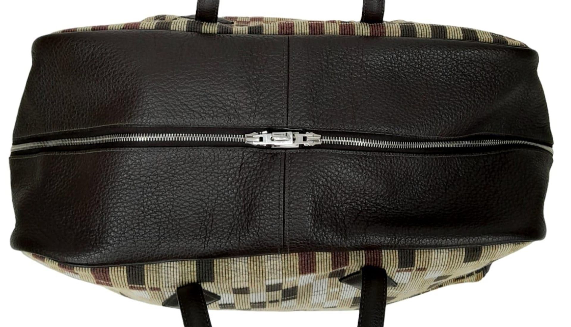 An Hermes 'Victoria' Luggage Bag. Textile and leather exterior with silver-toned hardware, 5 - Image 4 of 8