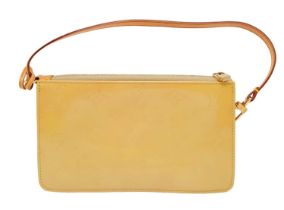 A Louis Vuitton lime yellow Lexington pouch bag, patent leather exterior, beige interior, gold