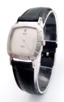 A Vintage Rolex Cellini 18K White Gold Cased Gents Watch. Black leather strap. 18k gold case - 32mm.