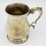 A Sterling Silver Tankard Given to the Thrusters! Hourglass design with an ornate handle.