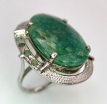 A 45ct Oval Cut Brazilian Emerald 925 Silver Ring. W-13g. Size N. Comes with a presentation case.