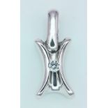 A 14K White Gold (tested) Diamond Pendant. 2cm. 1.2g total weight.