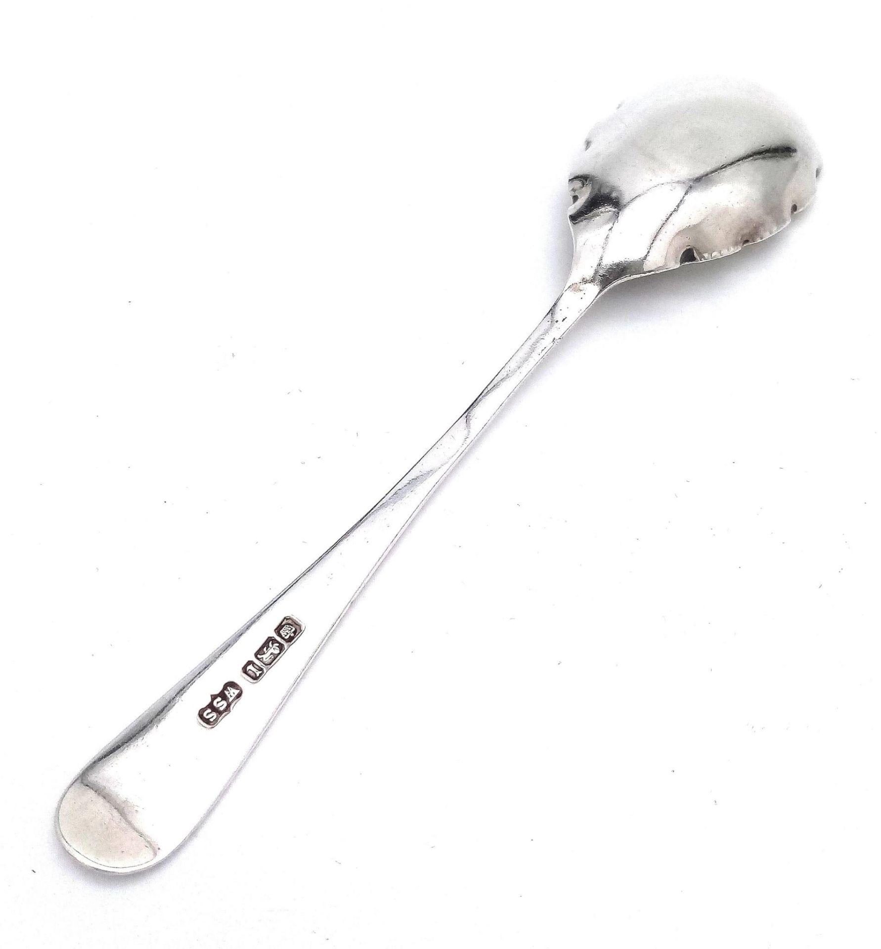 An antique sterling silver dessert spoon with fabulous floral motif engravings on bowl and handle. - Image 2 of 5