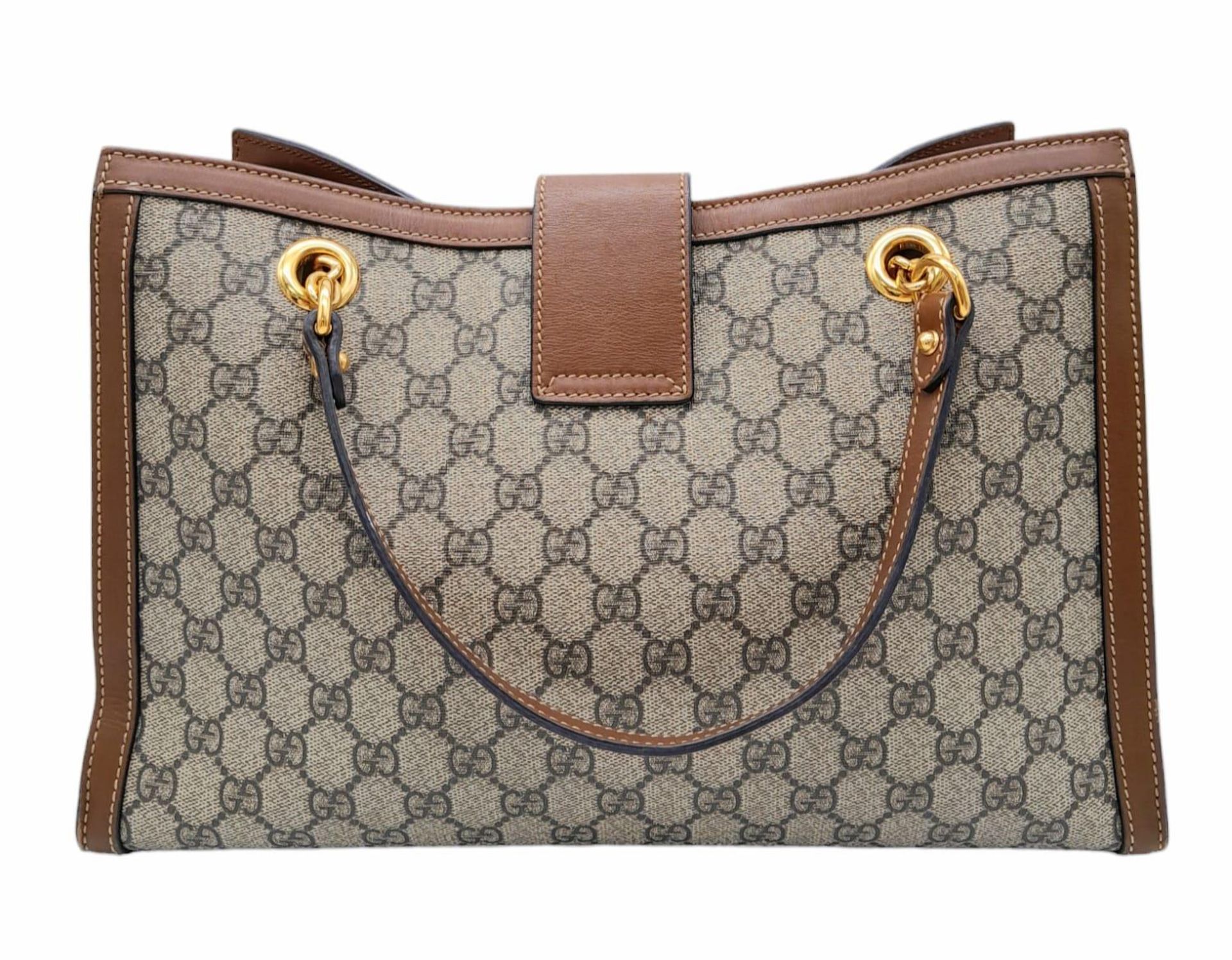 A Gucci GG padlock medium shoulder bag, gold tone hardware, brown suede leather interior. Size - Image 3 of 11