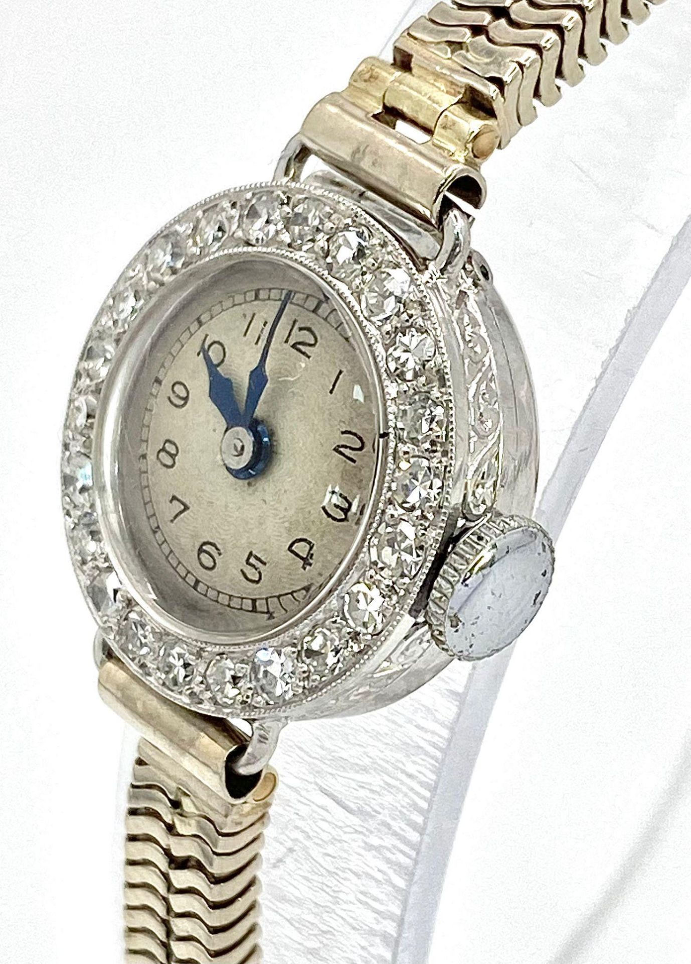 A ladies, platinum watch with diamond bezel and a 9 K white gold double snake chain bracelet. The - Image 4 of 6