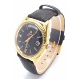 A Vintage Titoni Cosmo King Gents Watch. Brown leather strap. Gilded case - 38mm. Black dial with