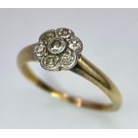 An 18K Yellow Gold Diamond Cluster Floral Ring. Size L. 2.5g total weight.