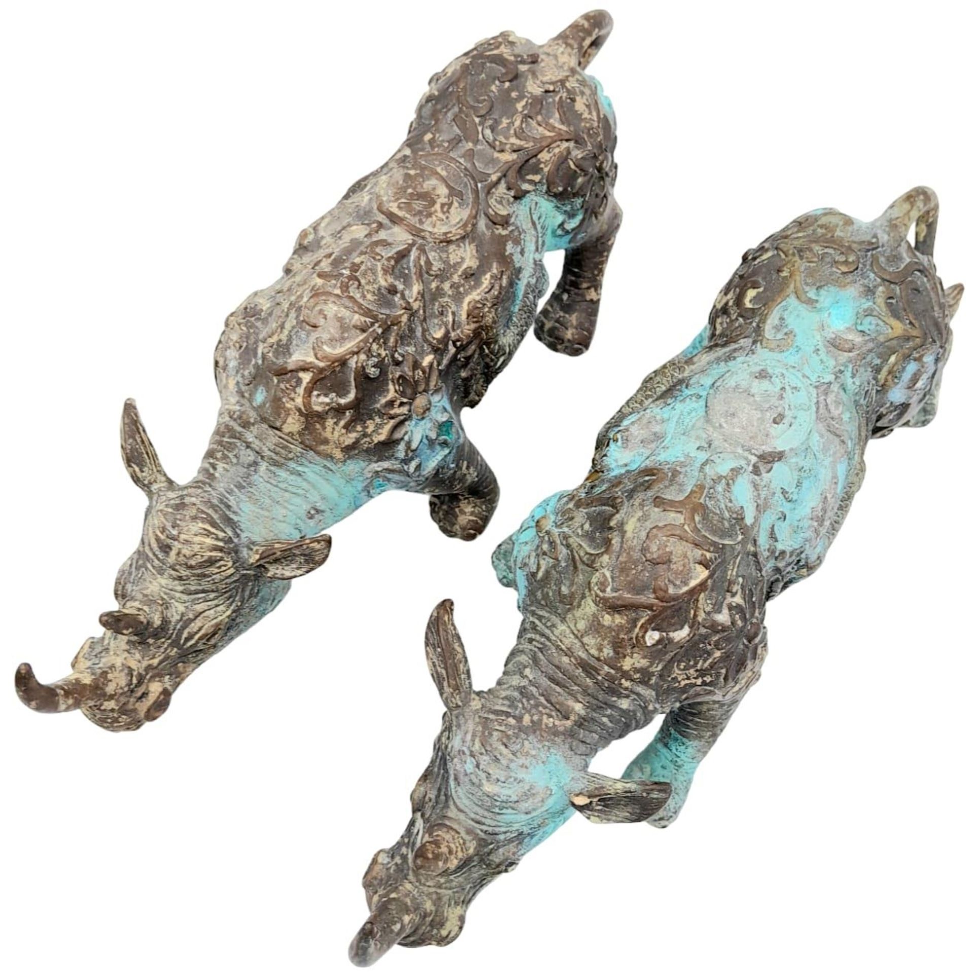 A PAIR OF VERY EARLY ANTIQUE CHINESE BRONZE WARE CEREMONIAL RHINOCEROSES WITH DRAGON ON FLANKS, - Image 3 of 8