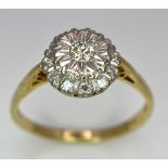 An 18 K yellow gold ring with a diamond cluster, size: P, weight: 3 g.