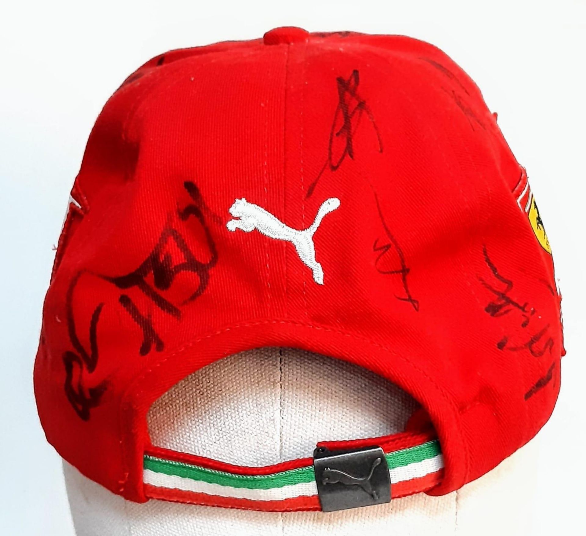 An Official Ferrari Team Cap - Over 20 signatures including Ferrari drivers and team principals. - Image 3 of 14