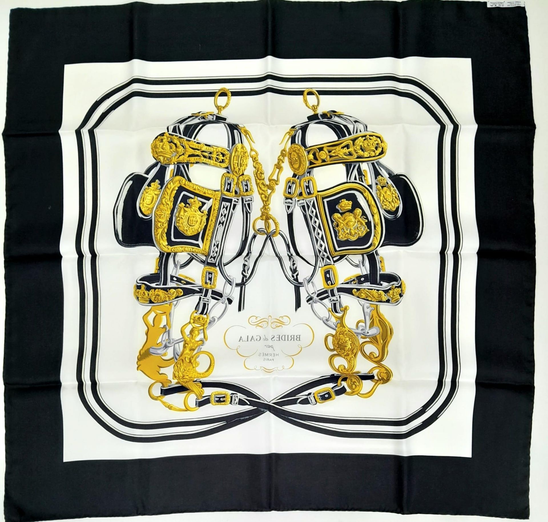 A Hermes Carre Silk Scarf "Brides de Gala" in Black, White and Gold Equestrian Print, features a - Image 3 of 5
