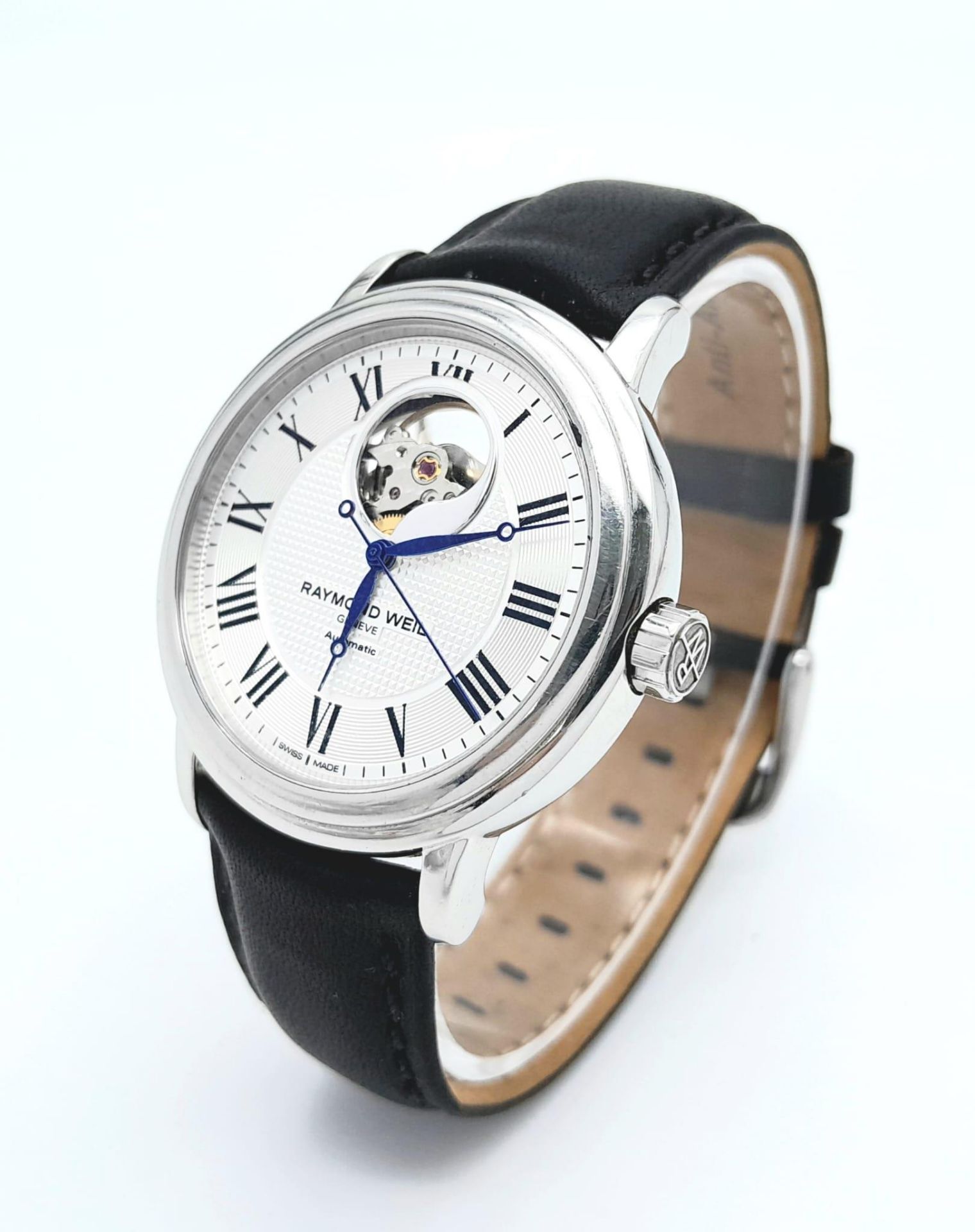 A Raymond Weil Automatic Gents Watch. Black leather strap. Stainless steel case - 40mm. Silver