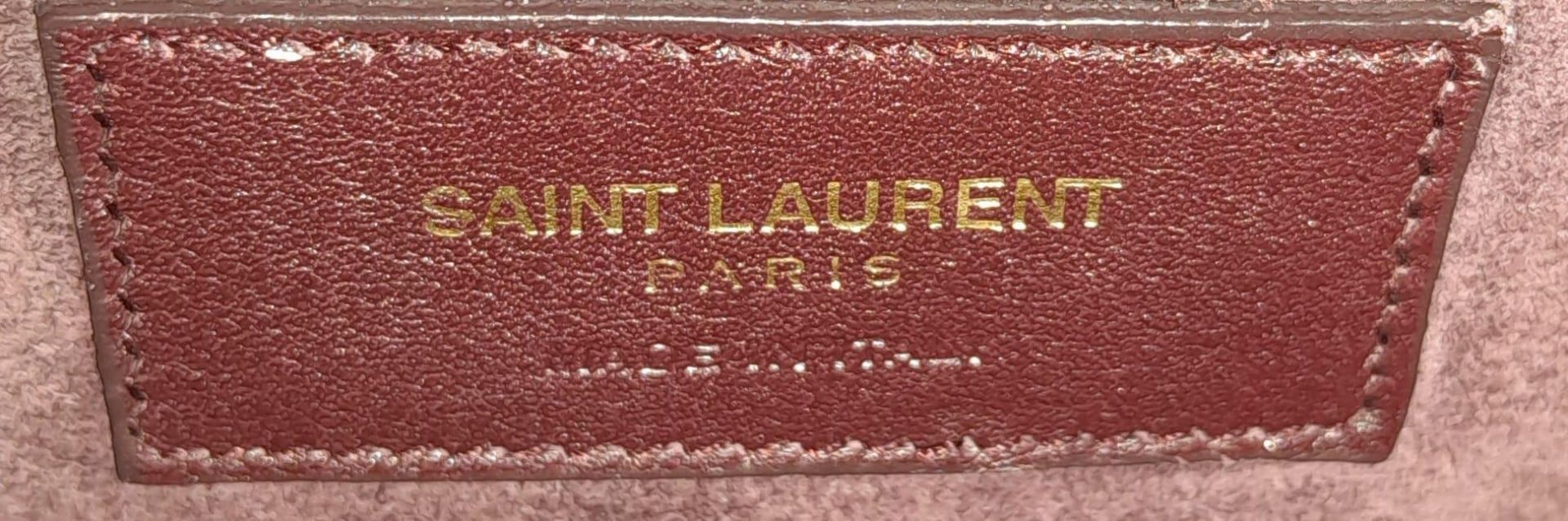 A Saint Laurent Sac De Jour Burgundy Handbag. Leather Exterior, Gold Tone Hardware, Double Handle in - Image 9 of 11