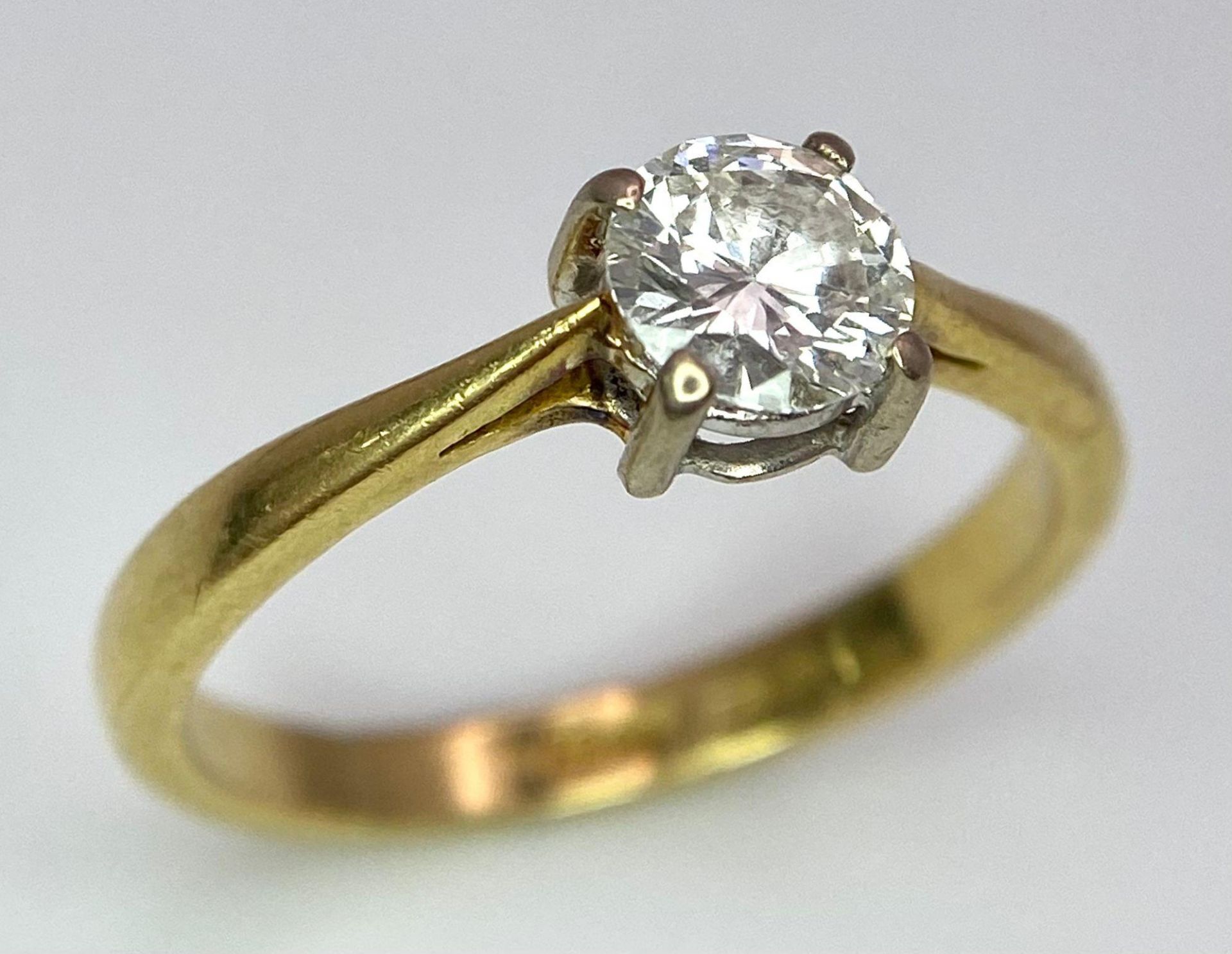 An 18K Yellow Gold Diamond Solitaire Ring. Brilliant round cut - 0.45ctw. 2.5g total weight. Size L. - Image 3 of 7