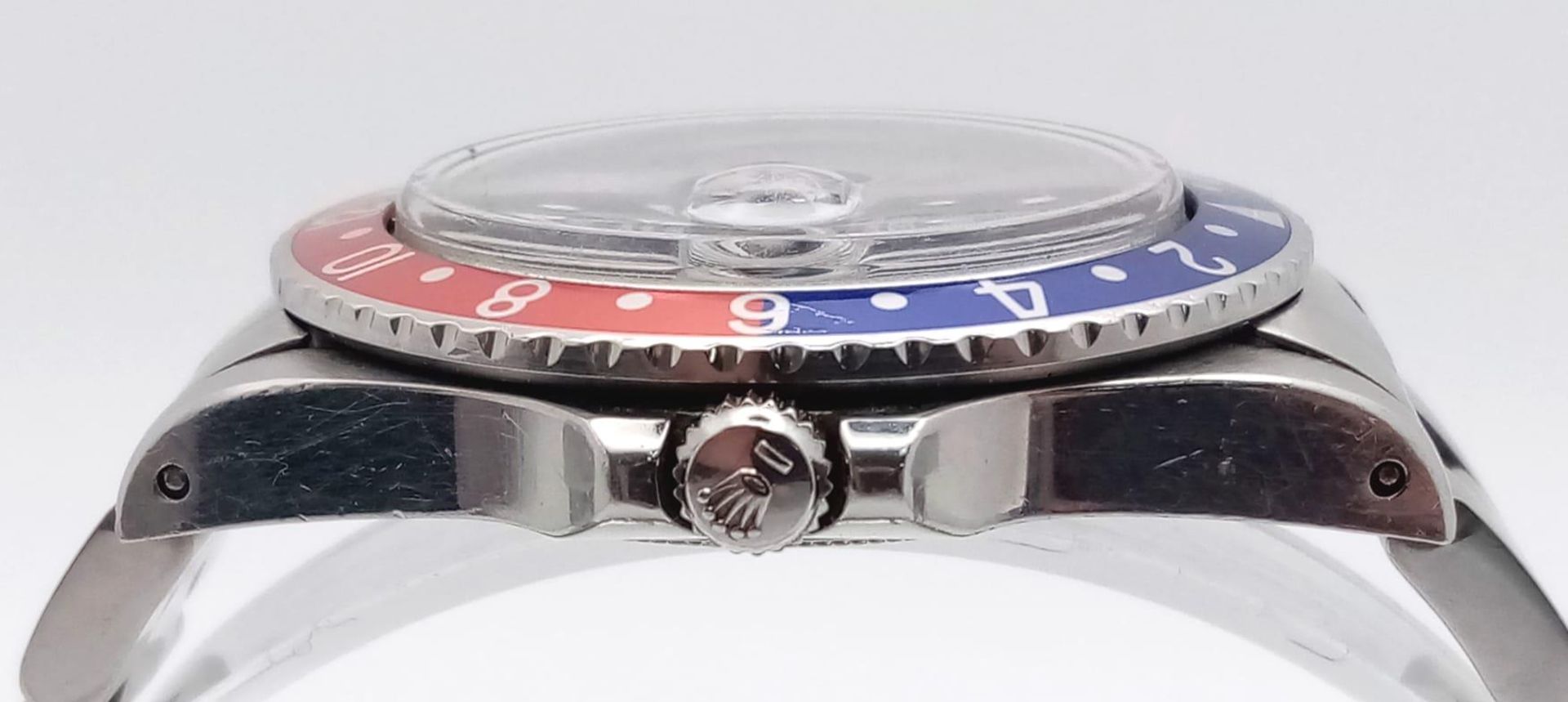 A Rolex GMT Master 16750 Automatic Gents Watch. Stainless steel bracelet and case - 40mm. 'Pepsi - Image 4 of 9