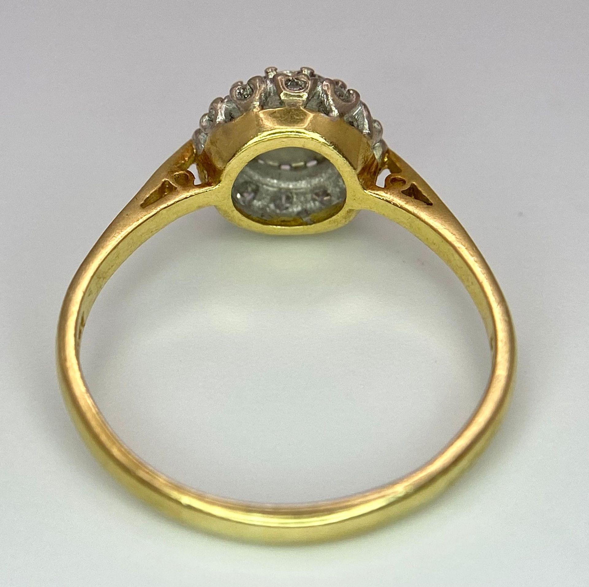 An 18 K yellow gold ring with a diamond cluster, size: P, weight: 3 g. - Image 6 of 8