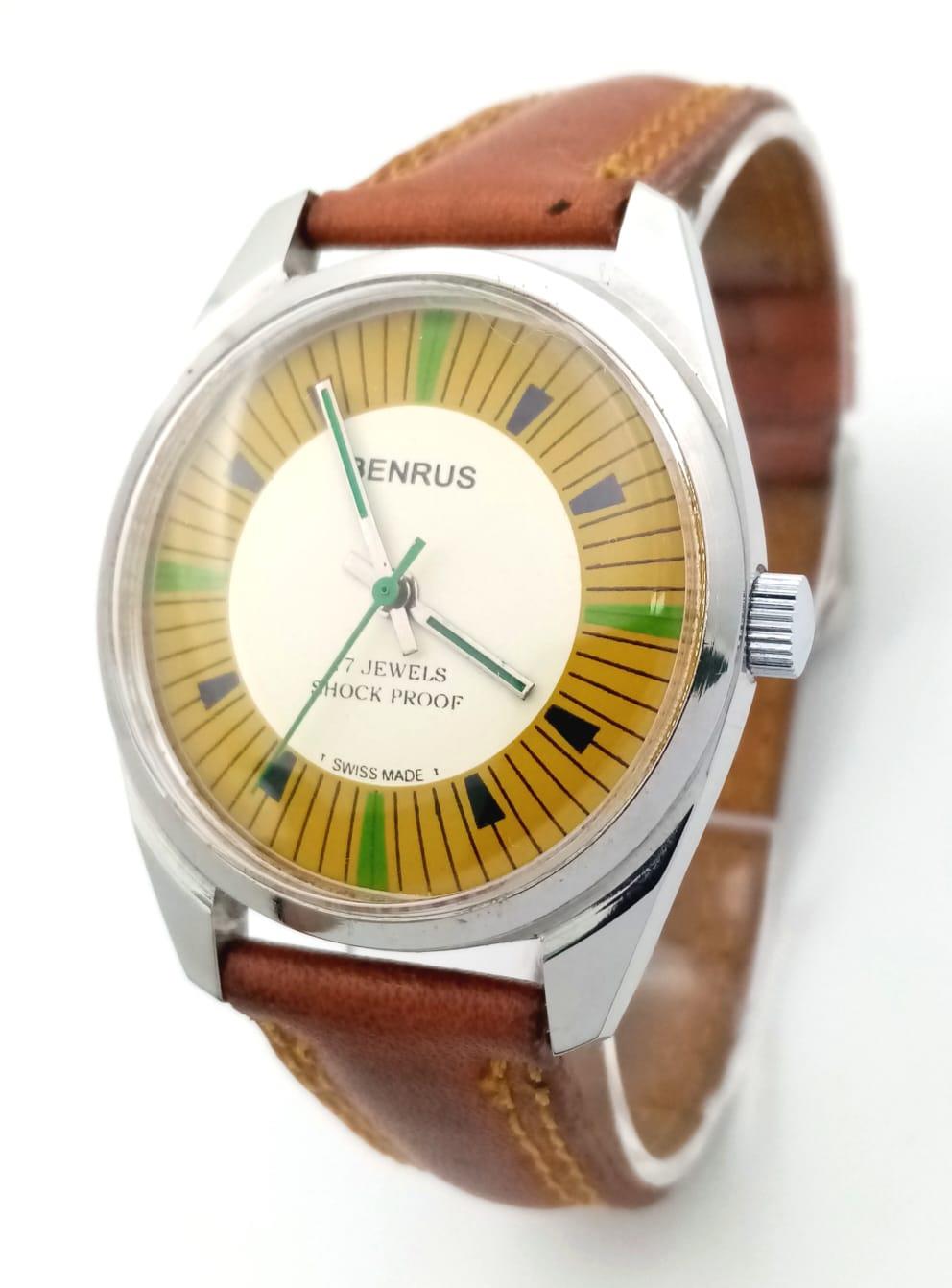 A Vintage Benrus Mechanical Gents Watch. Brown leather strap. Stainless steel case - 36mm. Two