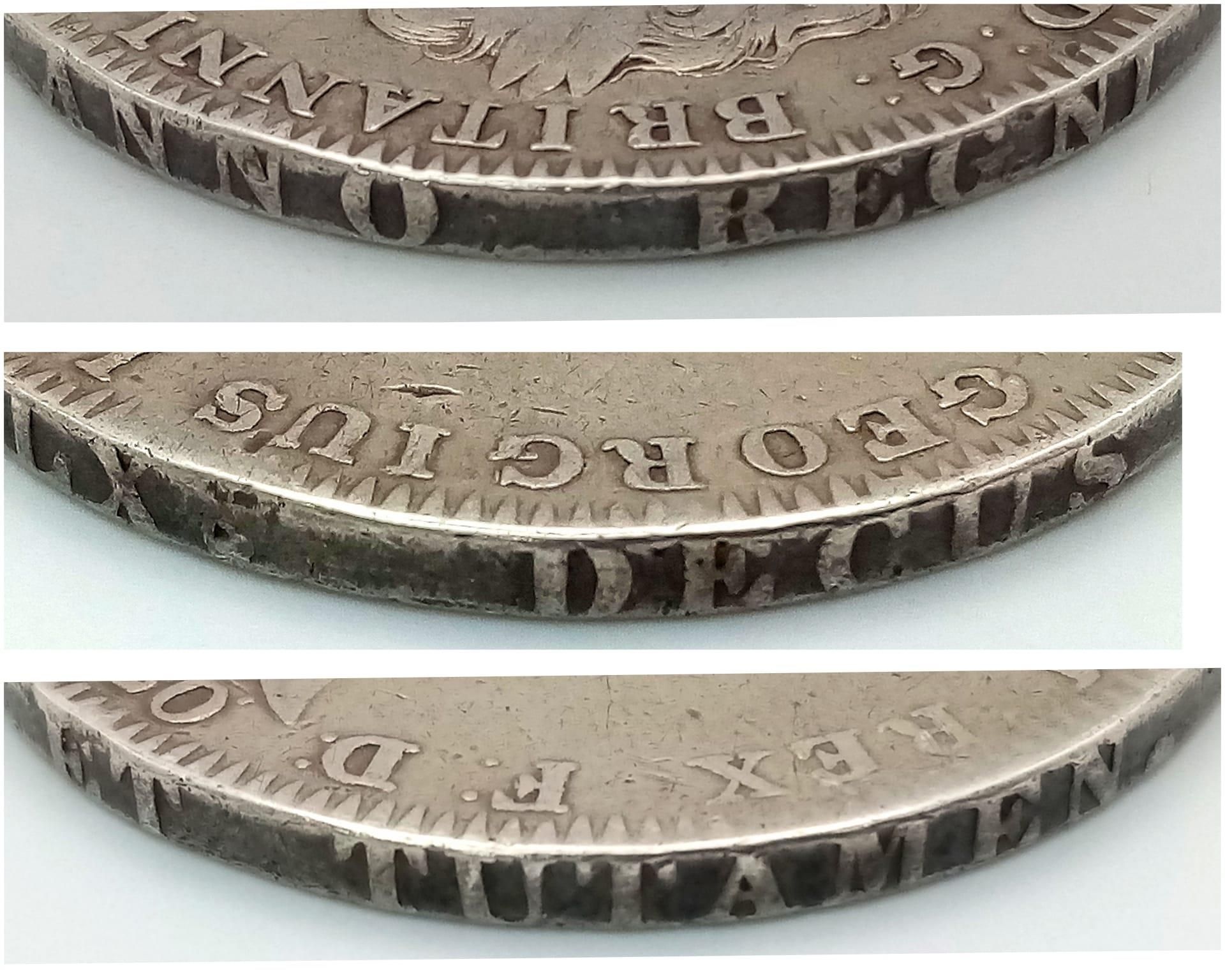 An 1820 George III Silver Crown Coin. F+ grade but please see photos. - Bild 2 aus 3