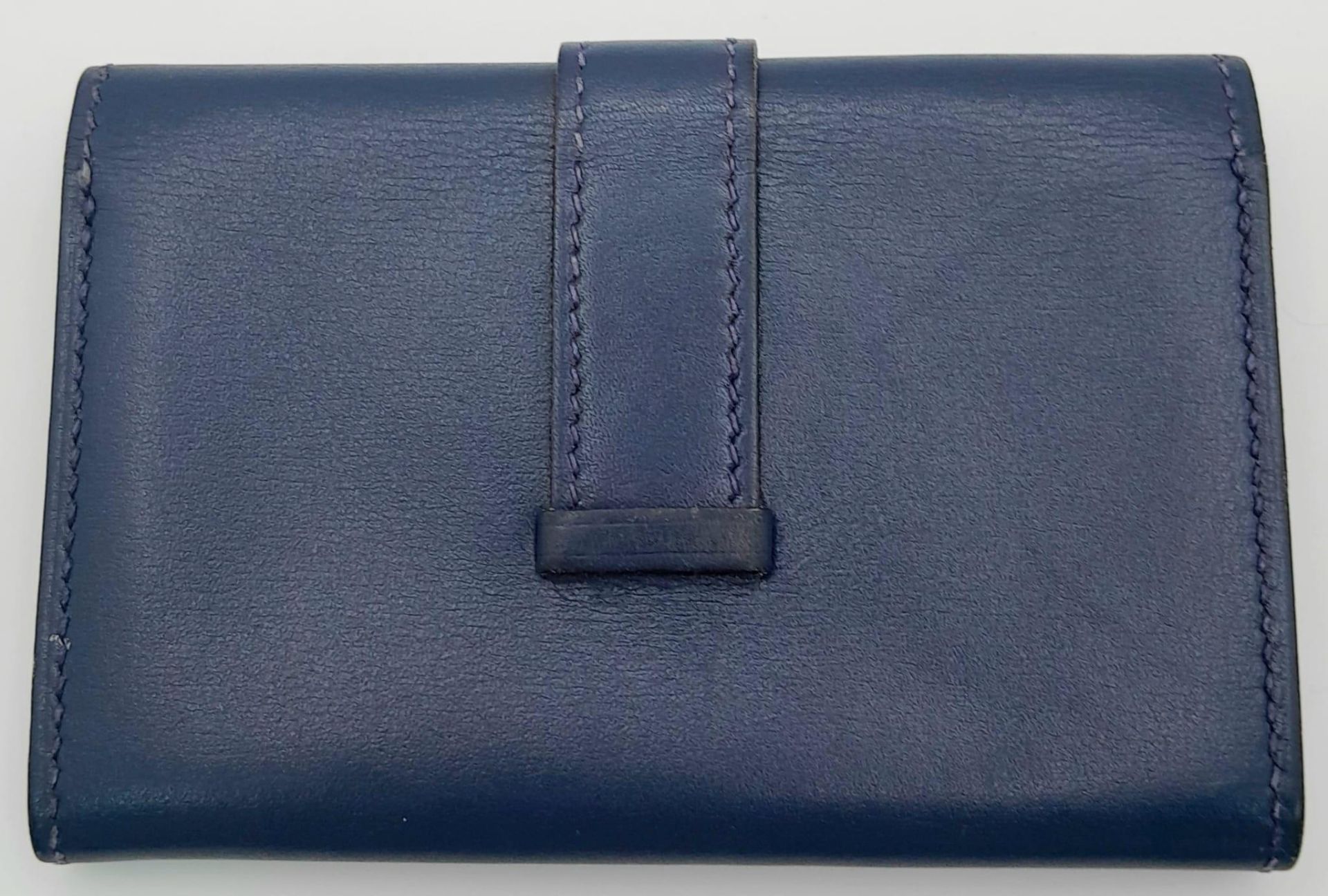 A Small Blue Leather Hermes Ladies Wallet. Flap design with Letter H branding. In good condition but - Image 2 of 7