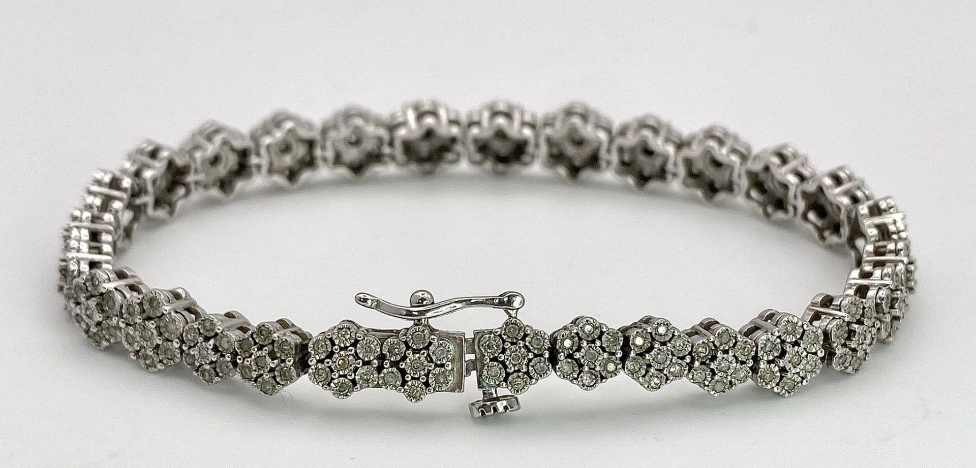 A 9K White Gold Graduated Link Diamond Tennis Bracelet. 29 links of seven small diamonds - 203 - Image 5 of 9