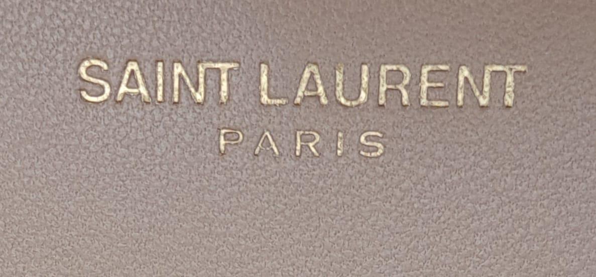 A Saint Laurent envelope shoulder bag, soft beige calfskin with gold hardware and strap, press - Image 8 of 11