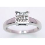 An 18K White Gold (tested) Diamond Ring. 0.30ct. Size M. 3g total weight.